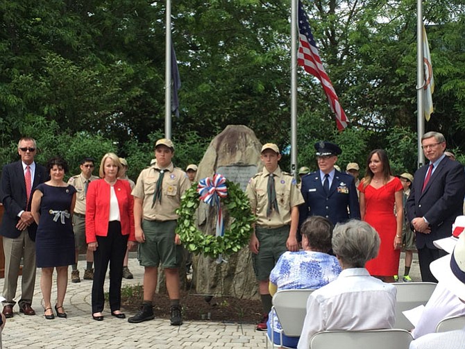 Local dignitaries, assisted by the Boy Scouts, lay a wreath at the Freedom Memorial in Great Falls, Virginia on Memorial Day, May 30, 2016. Photo taken from and links to a story in the Great Falls Connection.